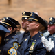 Kenneth Boss is seen as he gets promoted to the New York City Police Department rank of sergeant Dec. 17, 2015, at NYPD headquarters 17 years after he took part in the fatal shooting of the unarmed Amadou Diallo.
Howard Simmons/New York Daily News via Getty Images